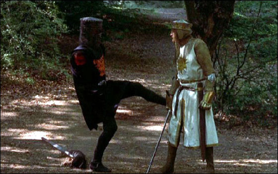 Monty Python scene where the black knight has lost his arms and is kicking at King Arthur